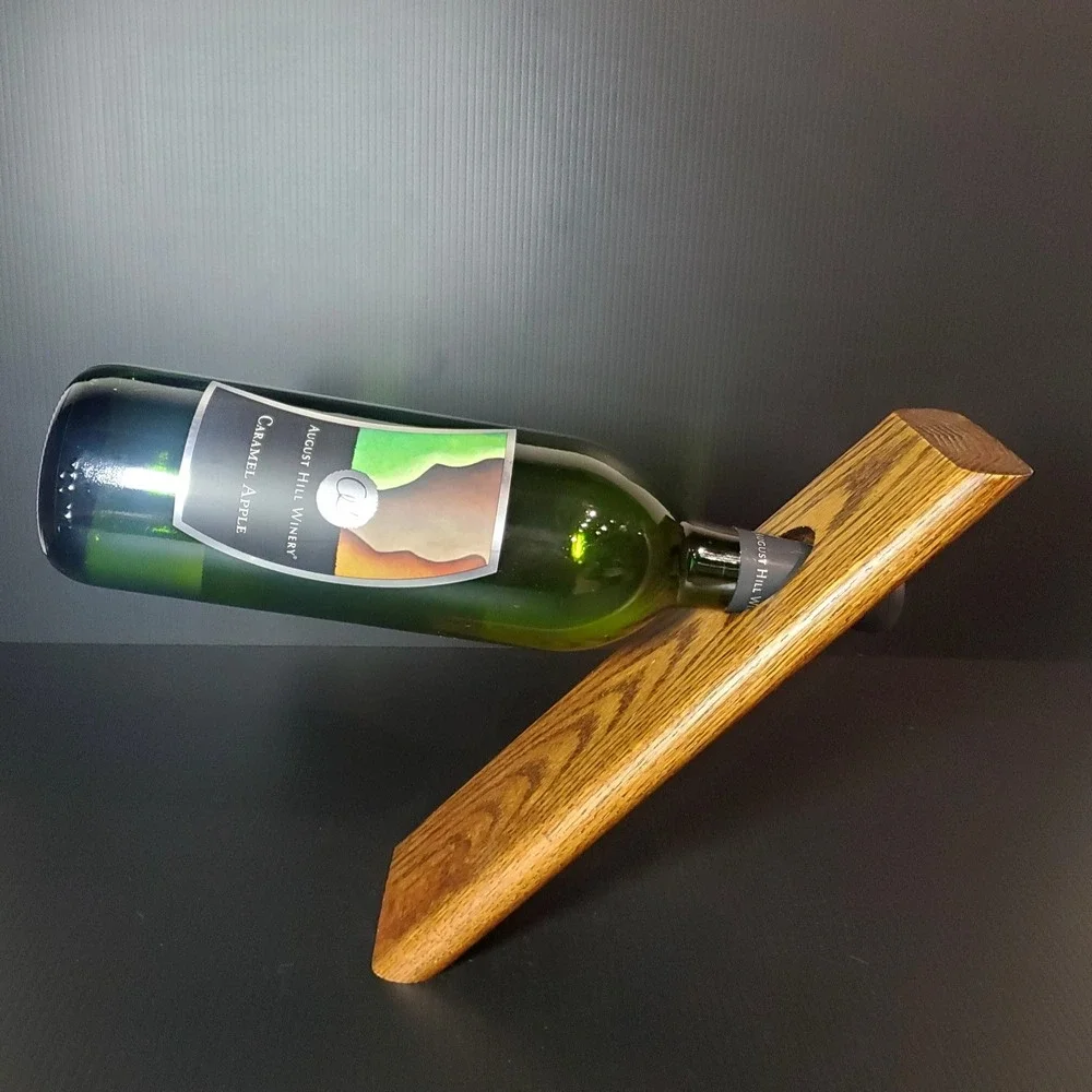Balancing wine bottle holder, holds a single bottle,‎ solid oak wood